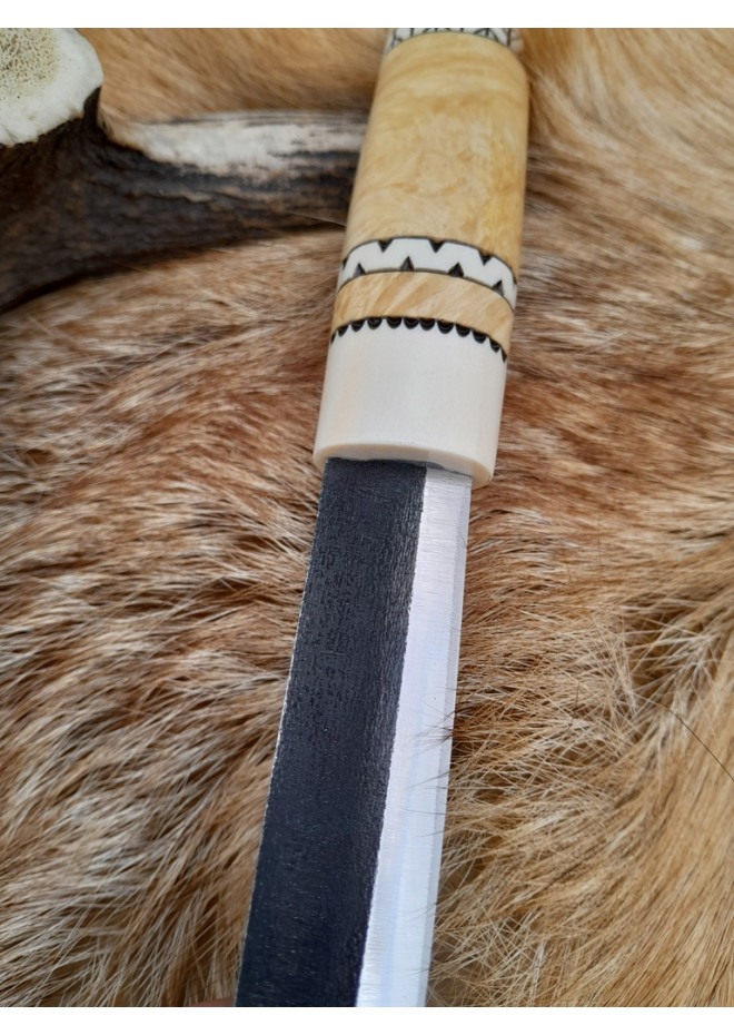 Handmade Puukko knife. Traditional Finnish craftsmanship.