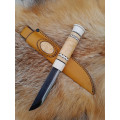 Handmade Puukko knife. Traditional Finnish craftsmanship.