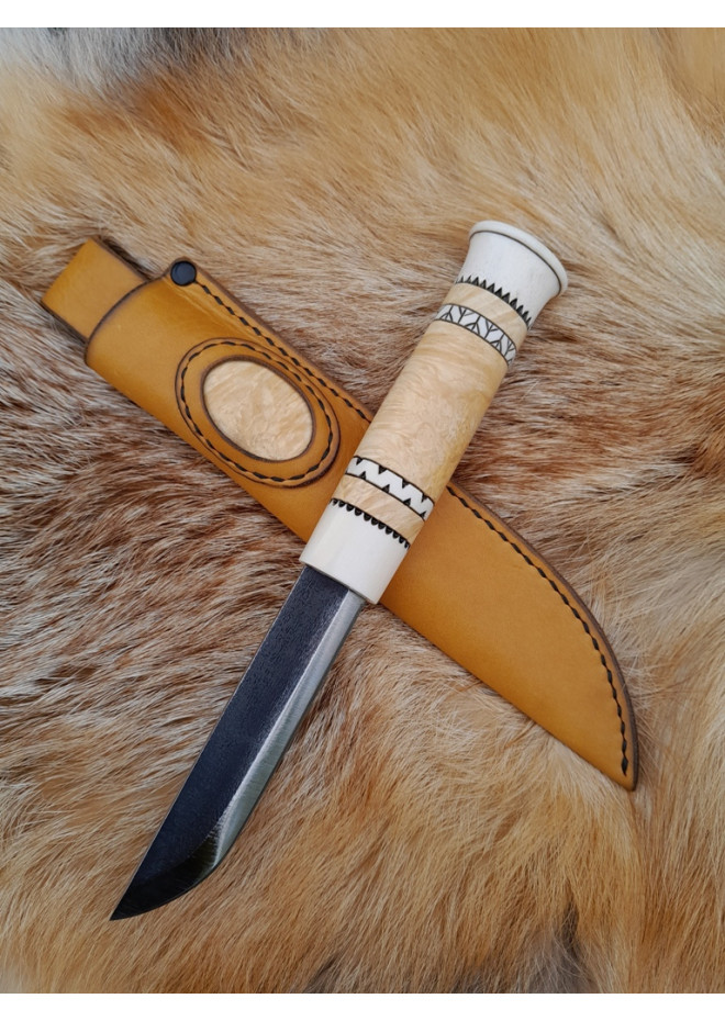 Handmade Puukko knife. Traditional Finnish craftsmanship.
