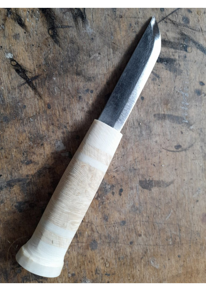 Handmade Puukko knife. Traditional Finnish craftsmanship.