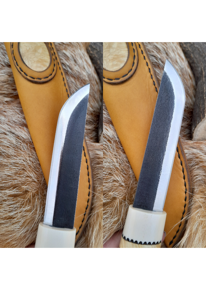 Handmade Puukko knife. Traditional Finnish craftsmanship.