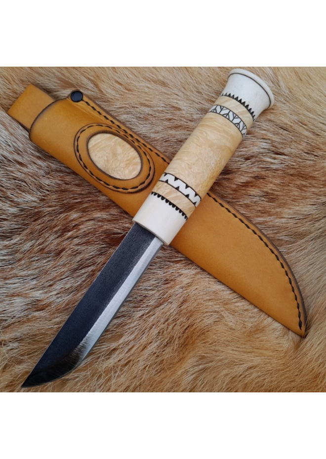 Handmade Puukko knife. Traditional Finnish craftsmanship.
