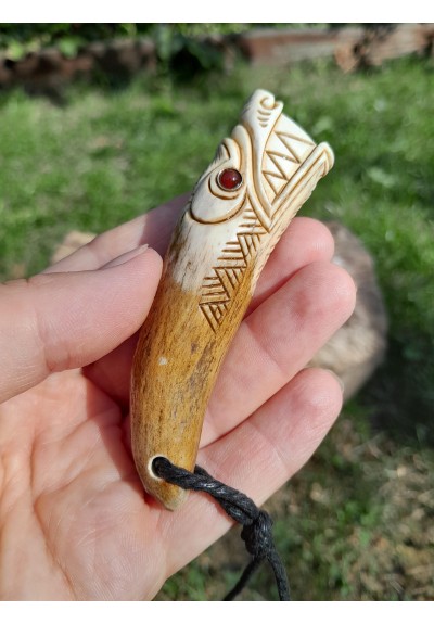 Beautiful moose antlers hand-carved Viking Wolf amulet with red eyes. Fenrir