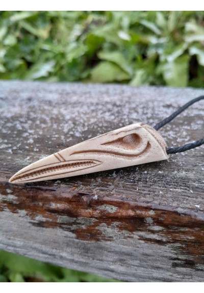 Hand-carved Viking raven skull amulet. Norse Raven of Odin jewelry.
