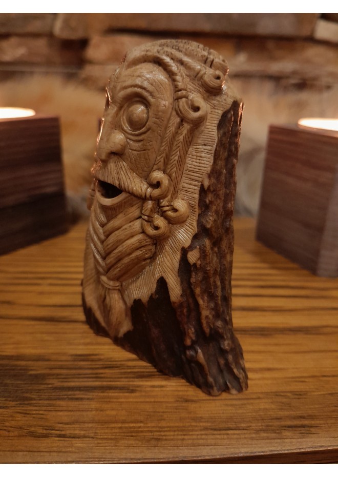 Old Norse God. Odin statue. Moose antlers hand-carved