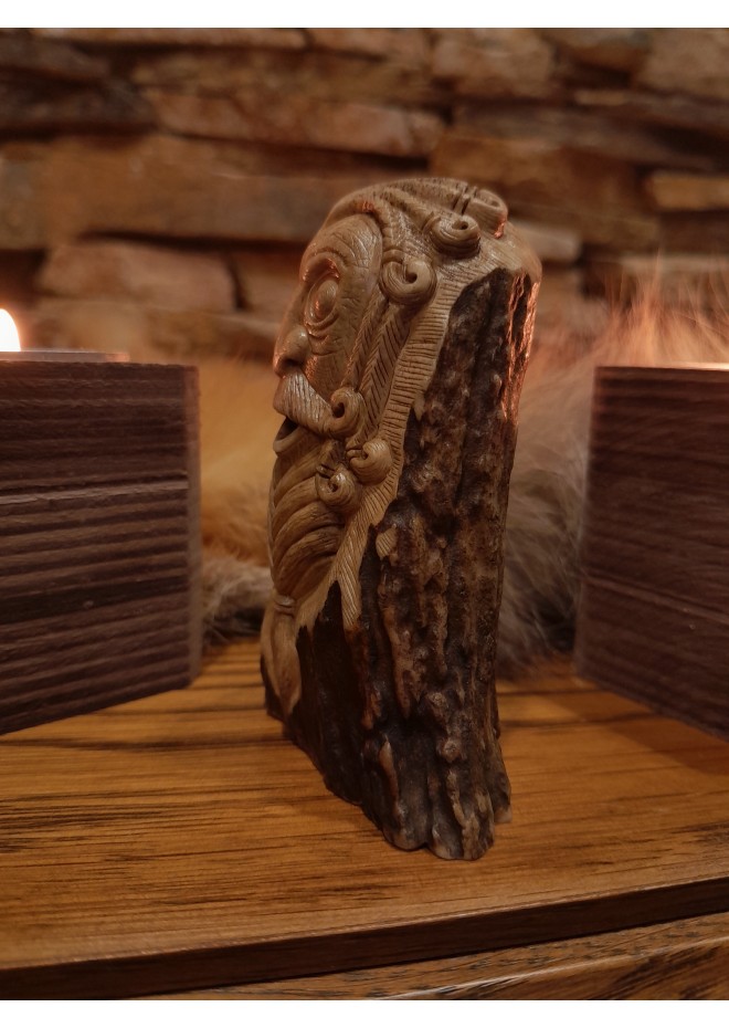 Old Norse God. Odin statue. Moose antlers hand-carved