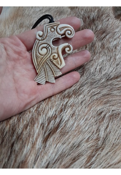 Moose antlers hand-carved Vendel Raven amulet of Viking era. Odins raven pendant. Huginn and Muninn 