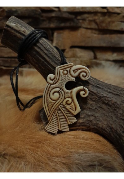 Moose antlers hand-carved Vendel Raven amulet of Viking era. Odins raven pendant. Huginn and Muninn 