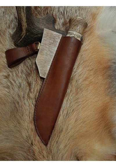 Handmade designer knife in the Norse style. Hand-carved handle with hand-forged Damascus blade, leather sheath. Viking zoomorphic knotwork