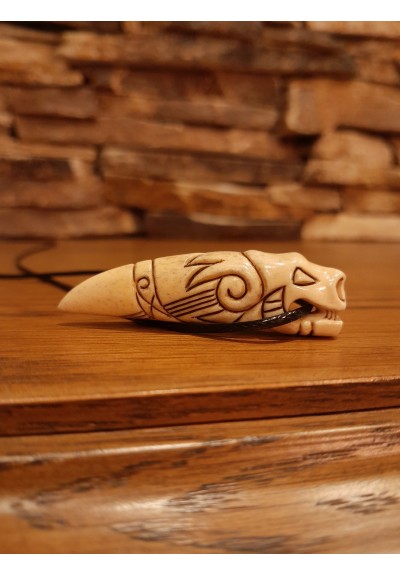 Hand-carved Dragon amulet.