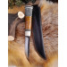 Handmade Finnish Puukko knife with master engraving and leather sheath. Hand-forged blade. Antler and stabilized maple burl handle.