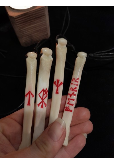 Handmade Wolf bone amulet with runes.