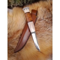 Handmade Finnish Puukko knife with master engraving and leather sheath. Hand-forged Carbon steel blade. Antler and wood handle.